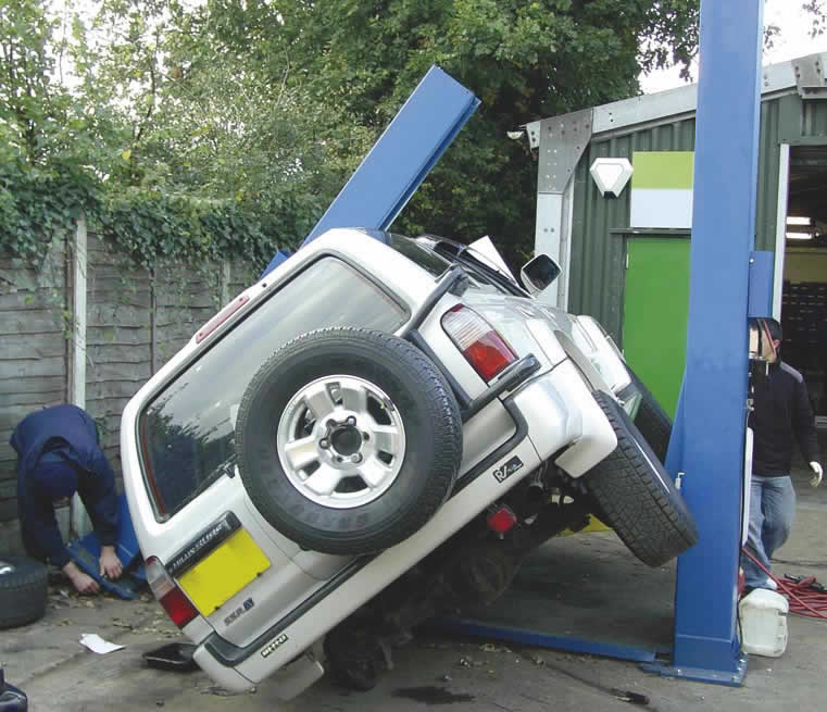 failure-caused-by-improper-usage-of-two-post-car-lift